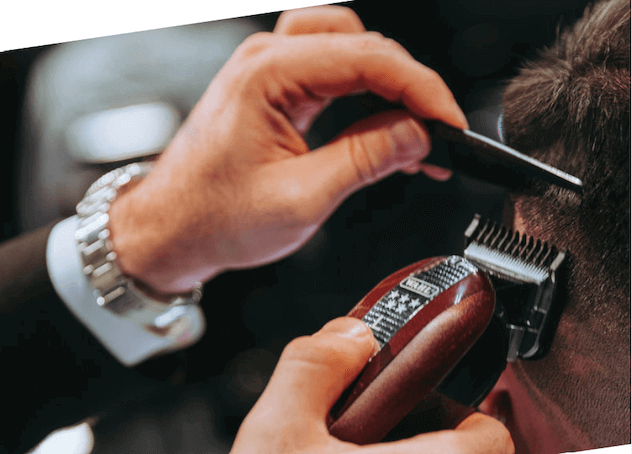 Barber cutting hair with Wahl Legend Clipper