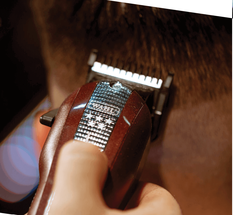 Barber cutting hair with Wahl Legend Clipper
